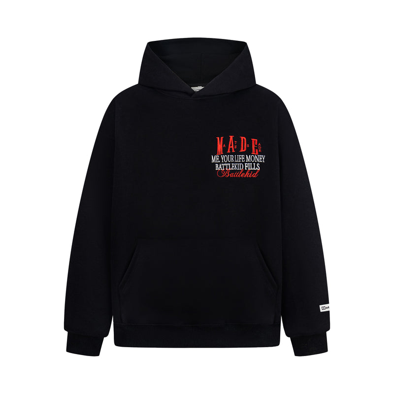 Black hoodie front view with small red embroidered MADE badge logo on chest