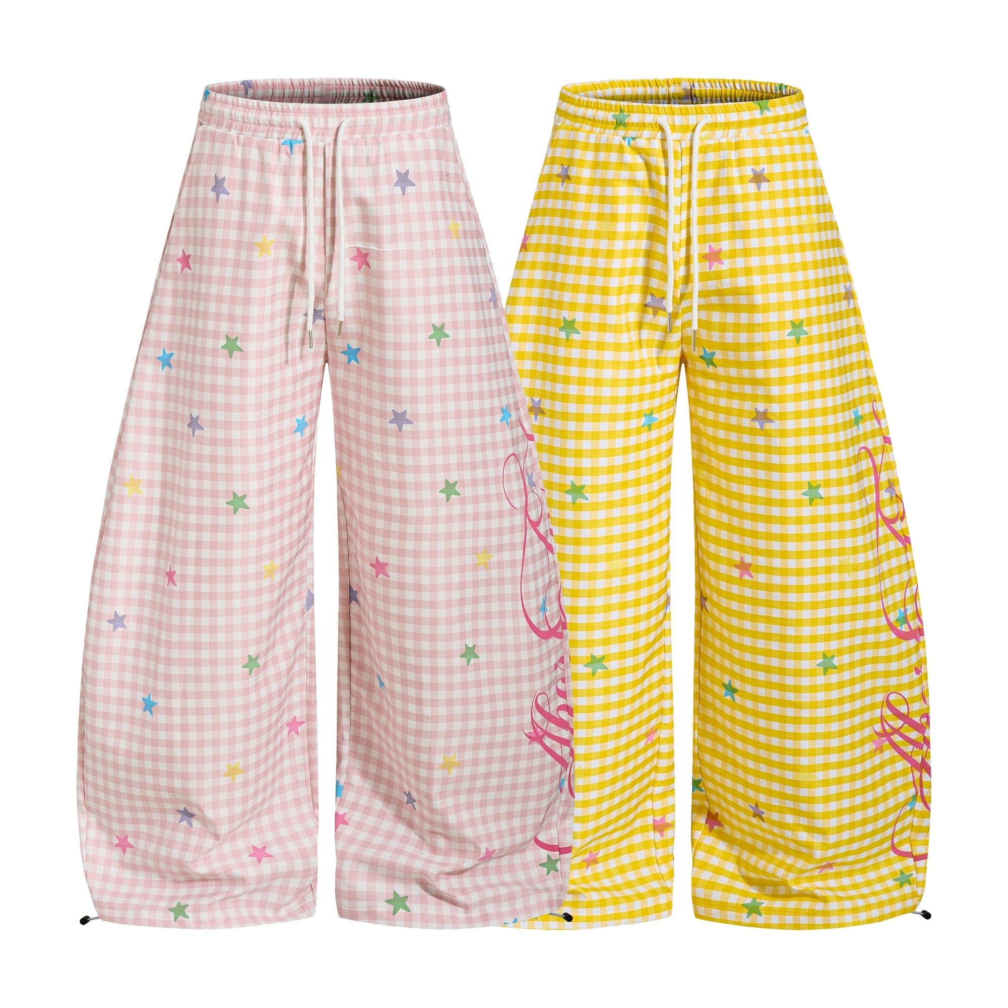 Pink gingham wide-leg balloon pants with multicolored star print and pink script graphic on the side leg