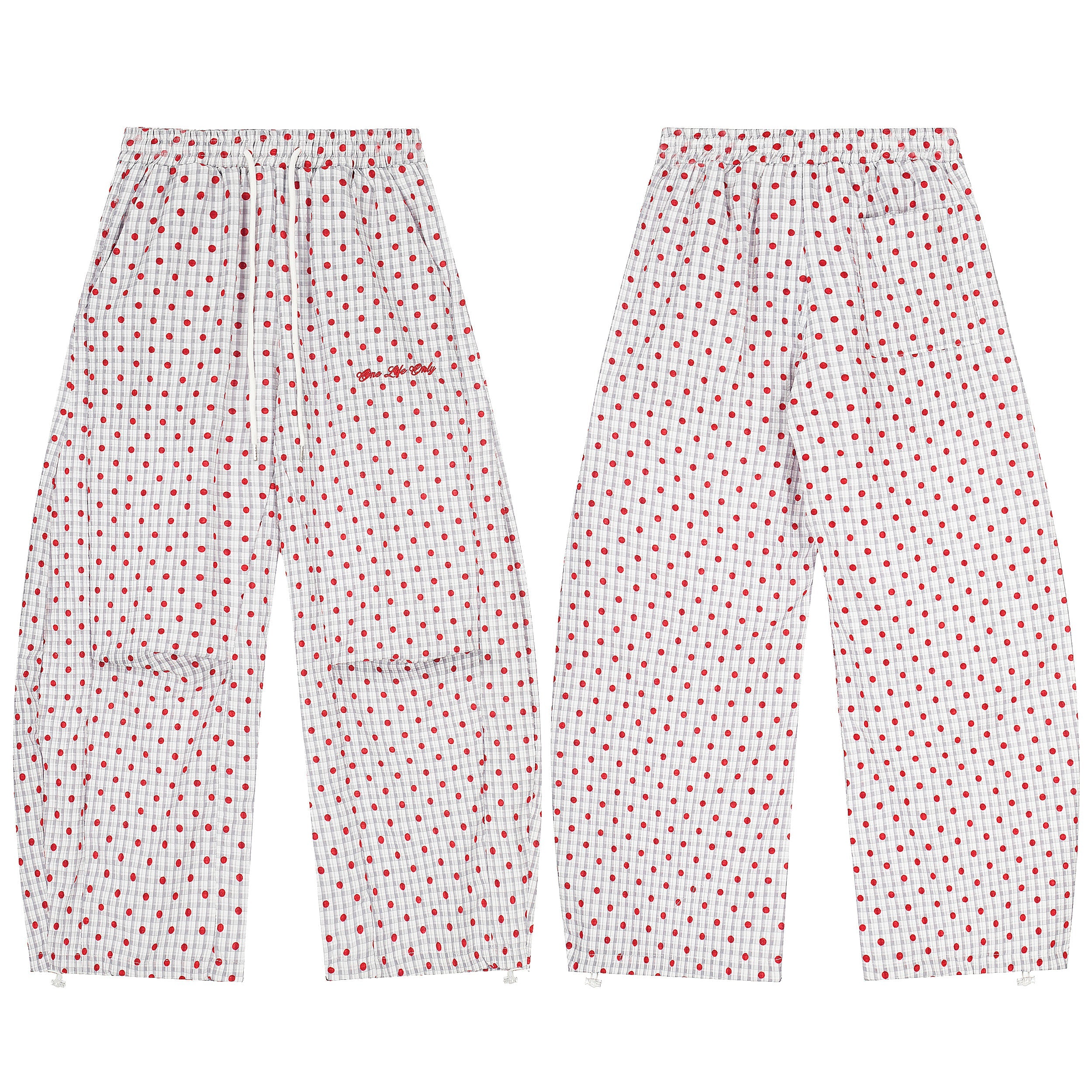 Front and back view of white wide-leg pants with red polka dots and grid texture, elastic waistband and drawstring