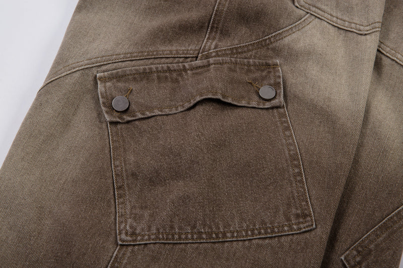 Close-up of a side cargo pocket with snap flap on brown barrel pants