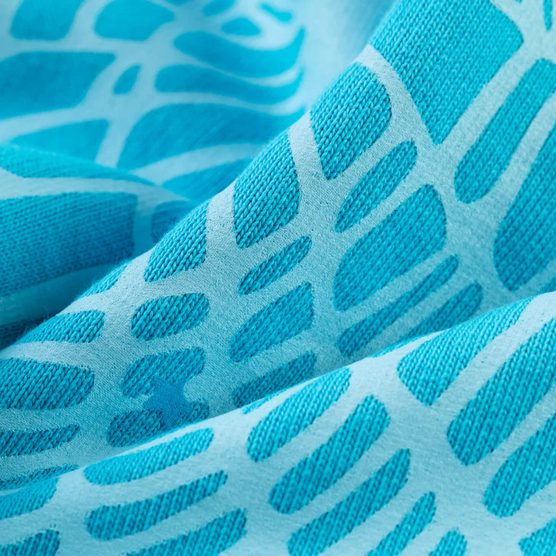 Close-up of the Sp5der “Nevermind the Spider” Hoodie – Sky Blue 440GSM Heavyweight Streetwear Pullover, showcasing premium cotton fleece with raised turquoise abstract patterns for a modern, textured look.