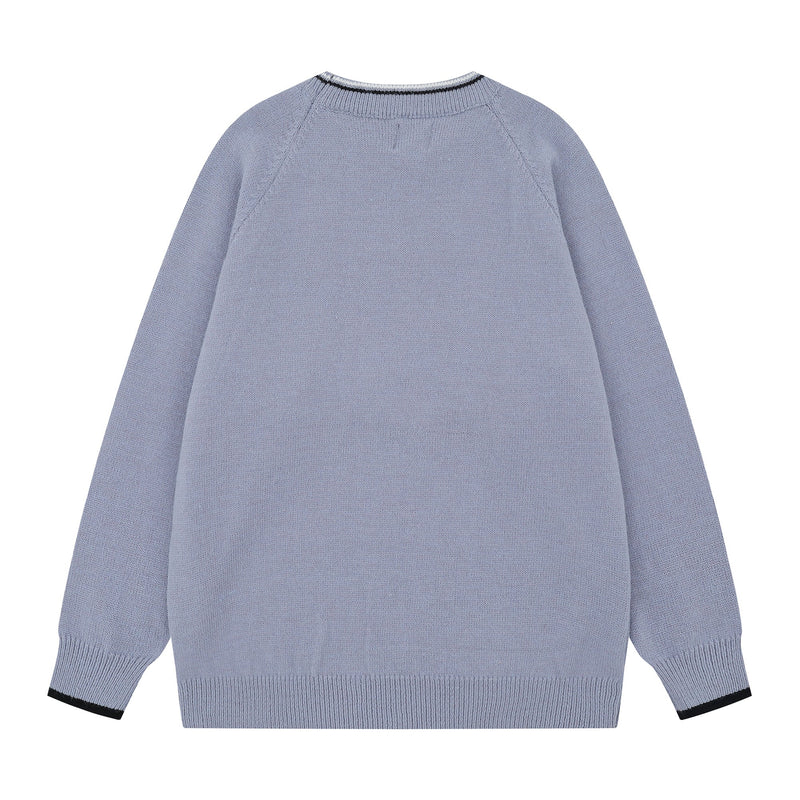 Light blue knit sweater back view with solid plain back and ribbed cuffs