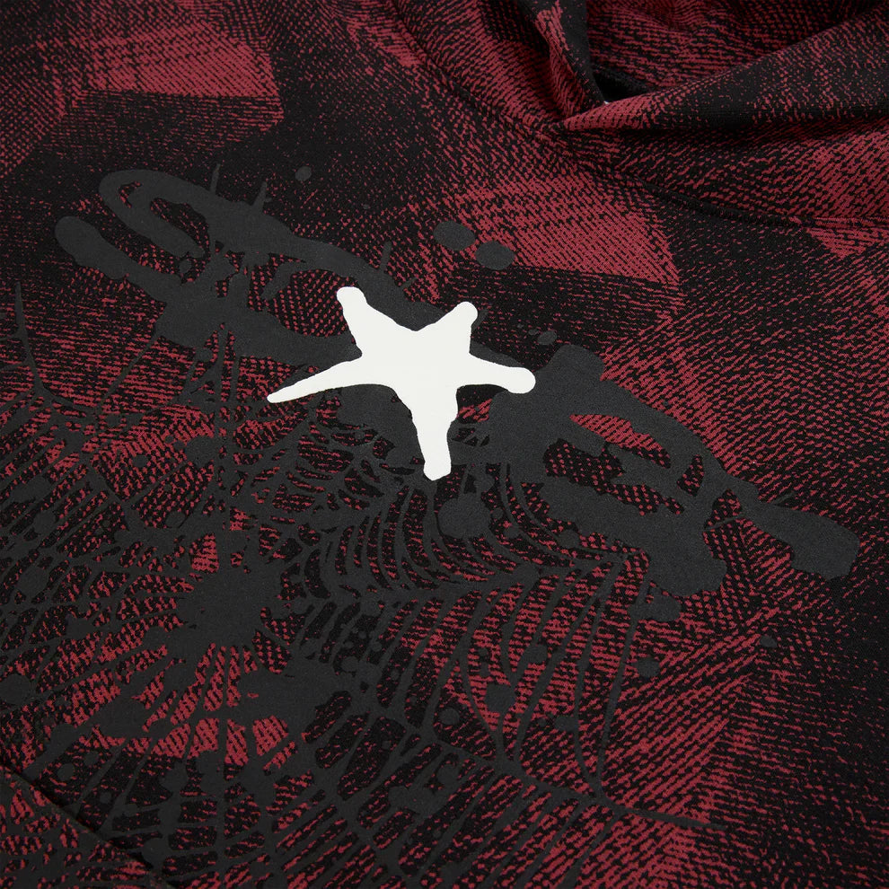 The Red and Black Graphic Hoodie with Star Detail and Spider Web Print features a striking white star graphic on an abstract red and black design, making this comfort fit pullover hoodie a bold streetwear statement.