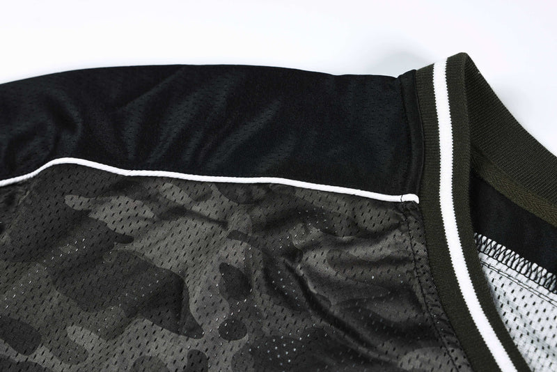 Dark camo mesh athletic jersey with black fabric, white piping, and striped ribbed collar detail