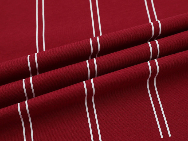 Red pinstripe sport jersey fabric with white vertical stripes, showing a textured streetwear tee design