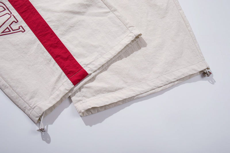 Cross Graphic Wide-Leg Track Pants | Streetwear Nylon