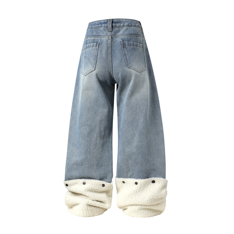 Back view of light blue wide-leg denim pants with fleece-lined hems