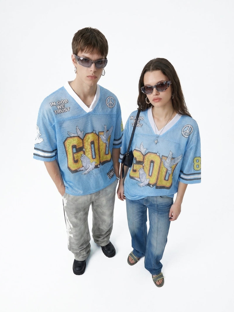 Blue mesh jersey T-shirts with oversized GOD graphic and peace sign patches, styled on two models in streetwear looks