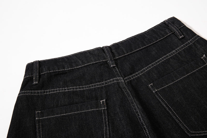 Back waistband and pocket area of black wide-leg jeans