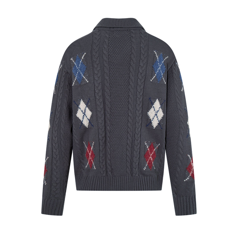 Back view of dark charcoal cable knit cardigan with blue and white argyle pattern