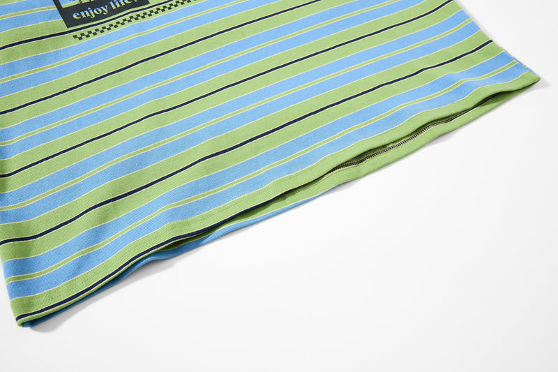 Close-up of striped hem with layered shirt edge