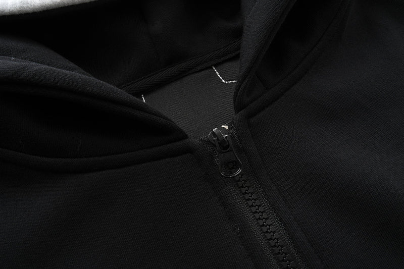 Close-up of black front zipper on the zip-up hoodie