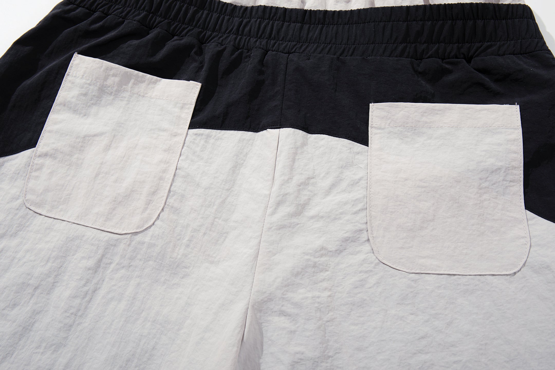 Script Graphic Wide-Leg Track Pants | Contrast Panel