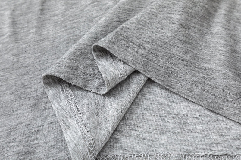 Close-up of gray long sleeve cuff with stitched hem detail