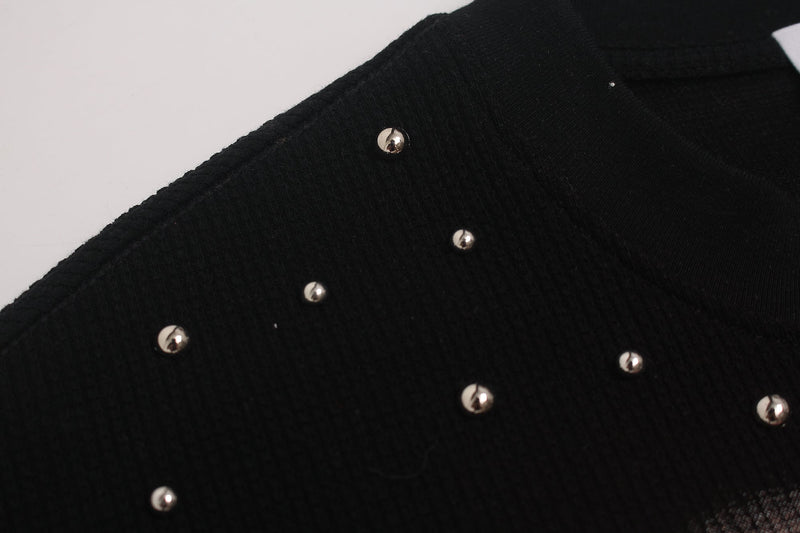 Black oversized T-shirt with scattered silver rhinestone studs on soft fabric, featuring a Y2K streetwear look