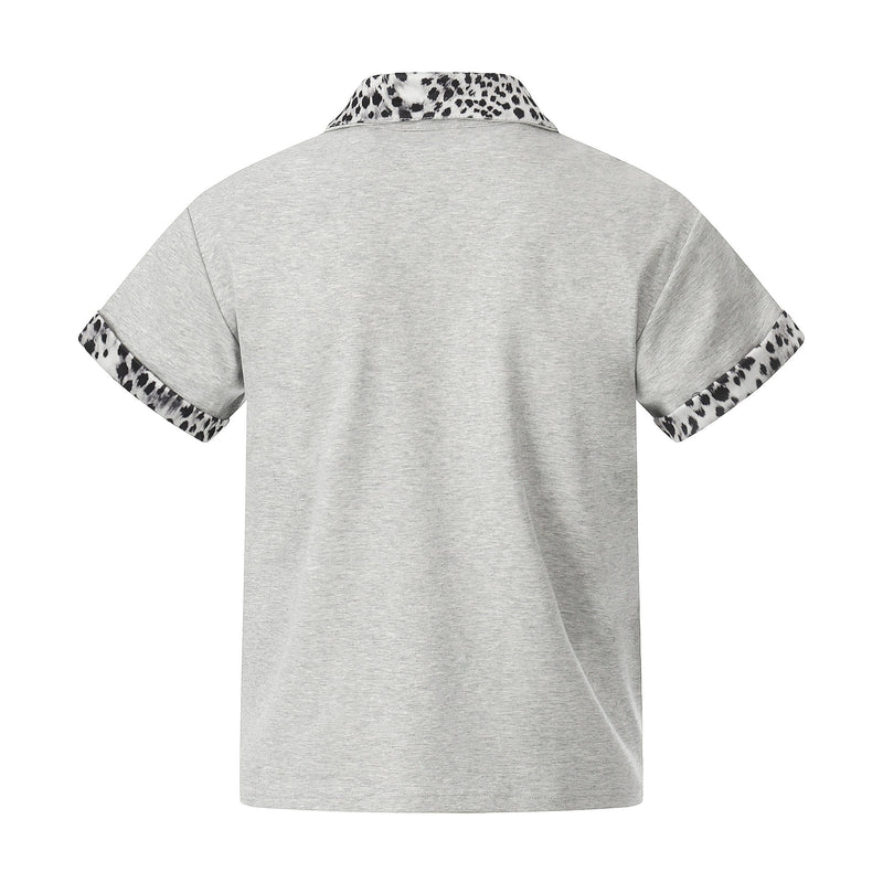 Gray quarter-zip polo shirt with leopard print collar and sleeve trims, shown flat on a white background