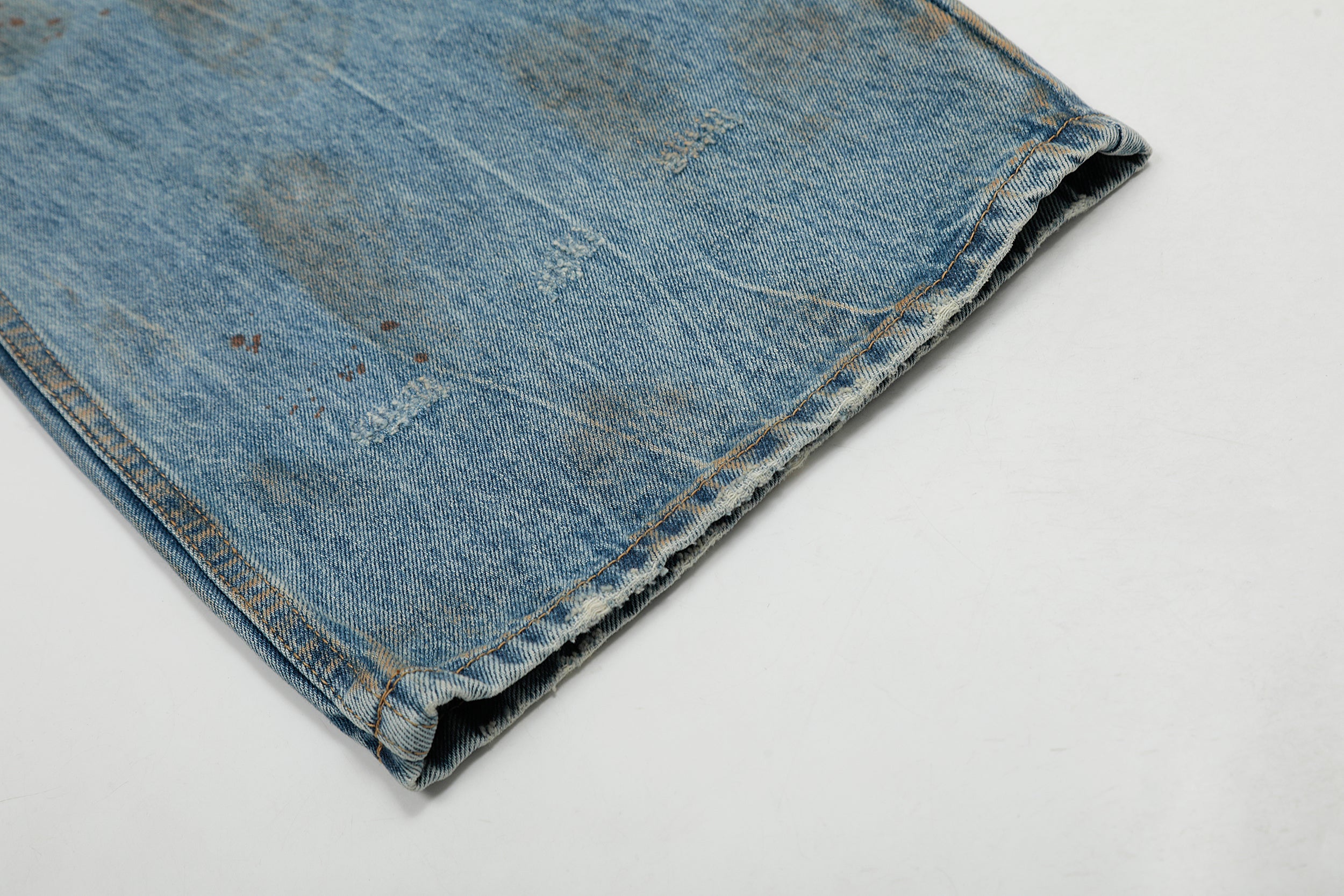 Rust-Wash Distressed Wide-Leg Jeans | Omirad