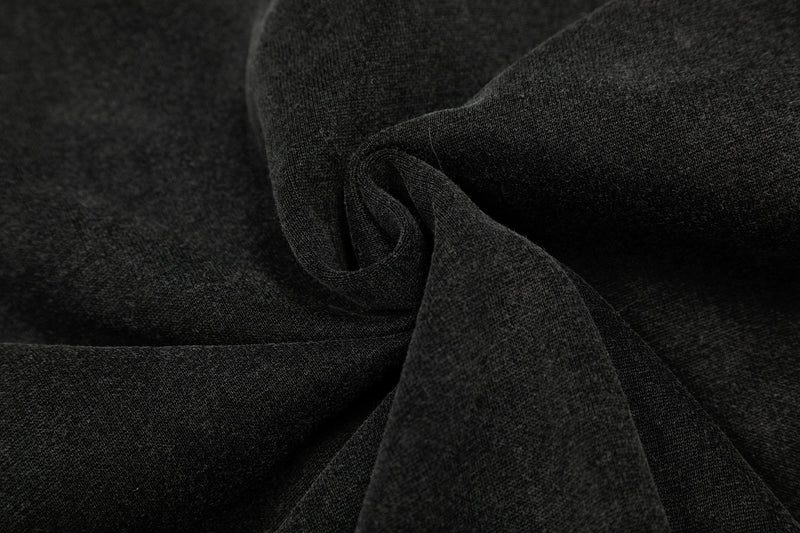Close-up of black hoodie fabric texture in a folded section