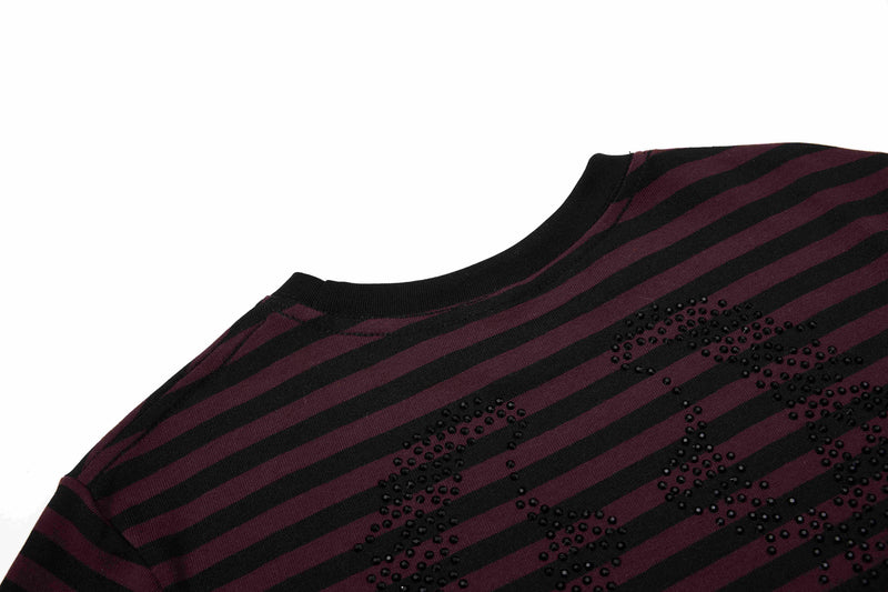 Black and burgundy striped Gothic script tee with rhinestone detailing across the chest on a white background