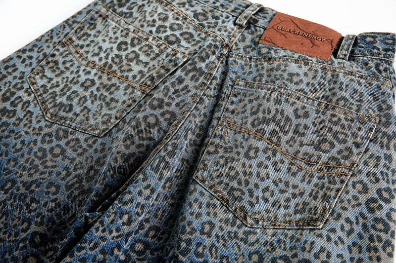 Close-up of light blue leopard print jeans back waistband and label patch