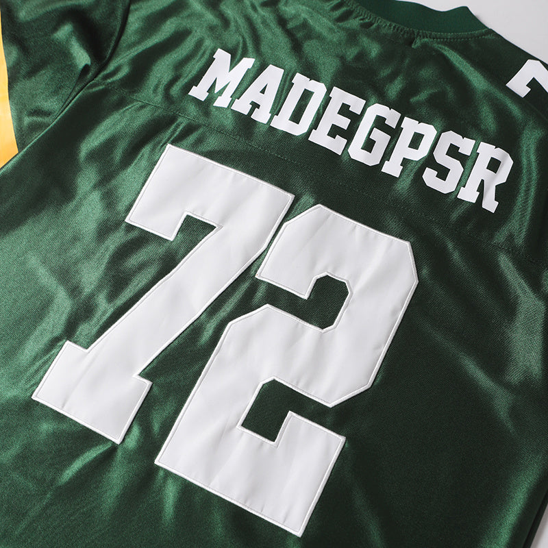 Green varsity football jersey with white number 72 and MADEGPSR lettering on the back