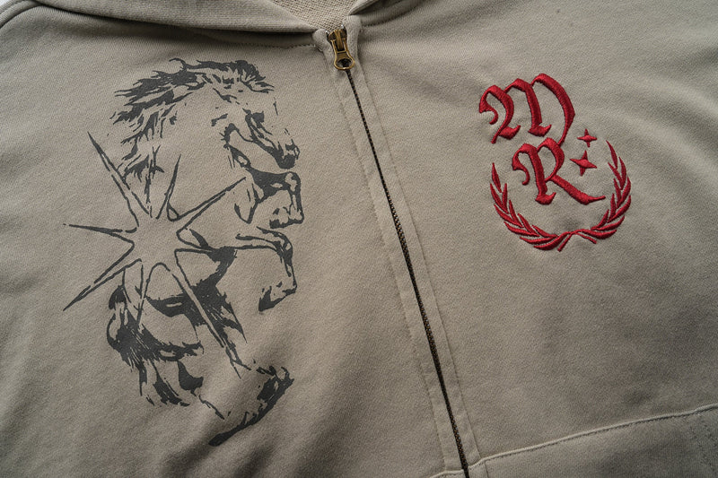 Front chest view of taupe zip-up hoodie with black horse graphic and red monogram