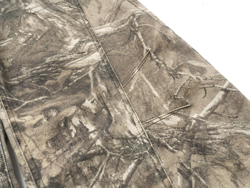Close-up of camo back pocket and seam detail on the pants