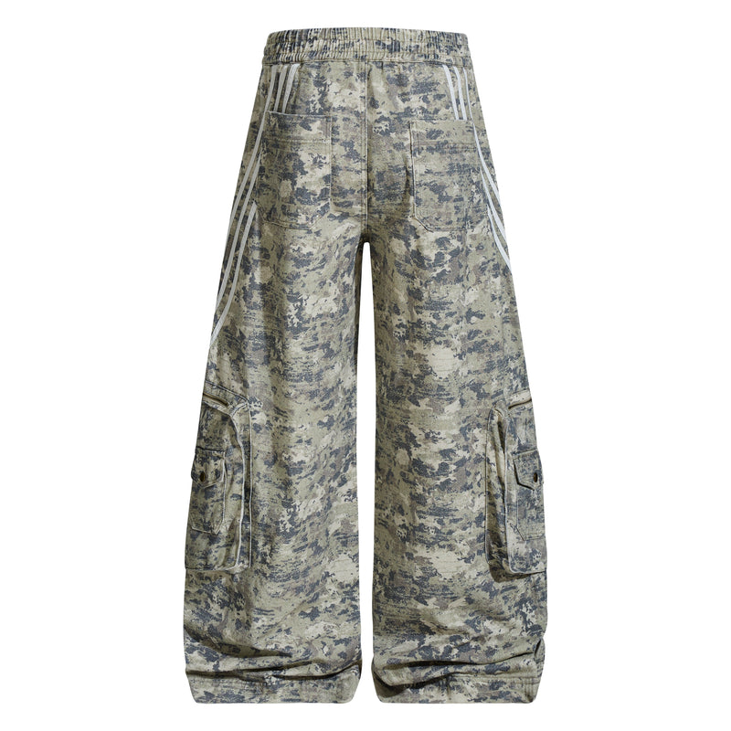 Back view of camouflage wide-leg cargo pants with reflective side stripes and back pockets