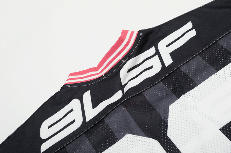 Black and white mesh football jersey with bold 33 graphic and pink striped collar detail