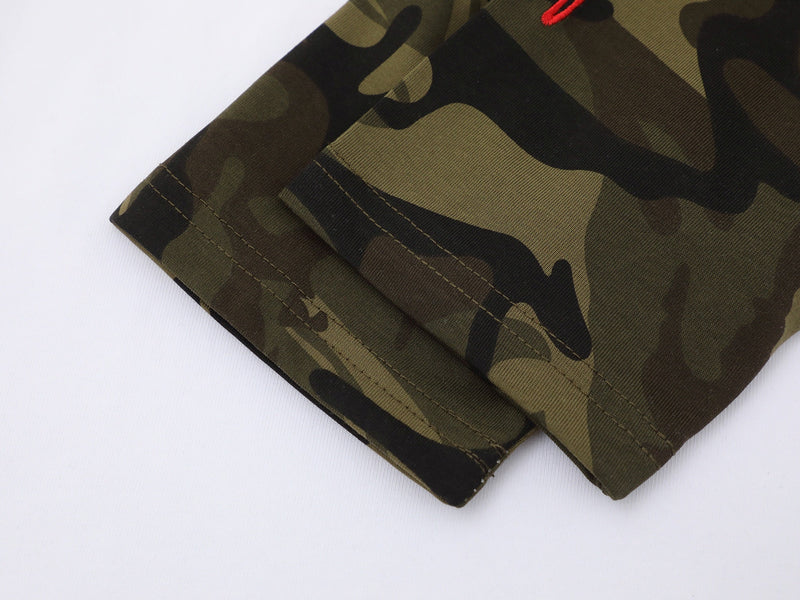 Close-up of camouflage sleeve cuff with straight hem and topstitching