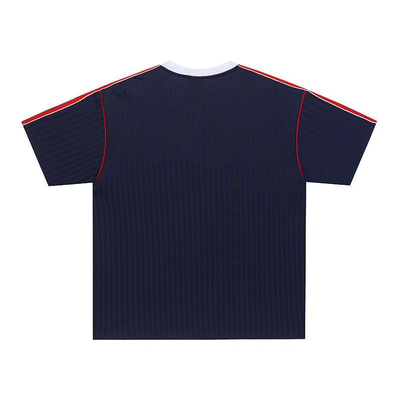 Navy soccer jersey with red shoulder stripes and black ribbed texture, shown from the back on a white background