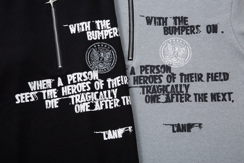 Black and gray half-zip graphic streetwear tees with distressed text and eagle emblem print