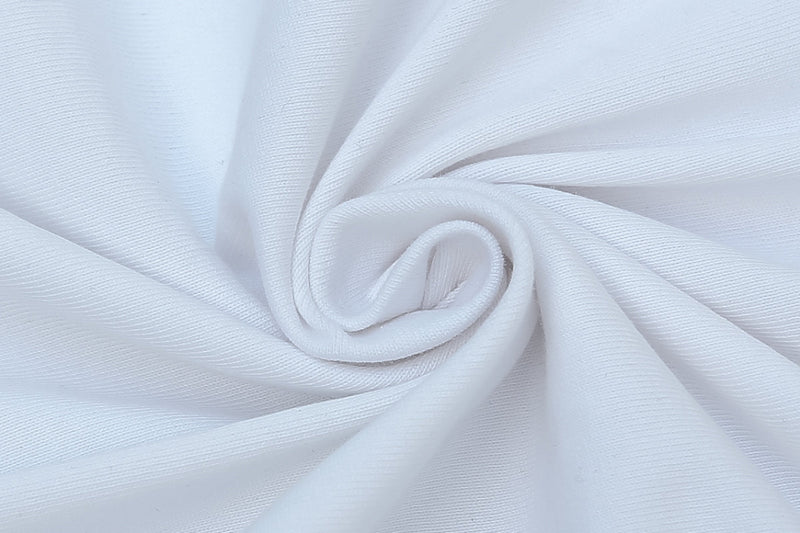 Close-up of white fabric with soft folded texture