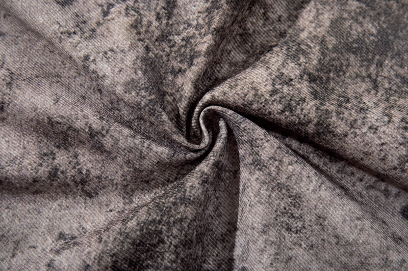 Close-up of faded grunge denim fabric with wrinkled texture