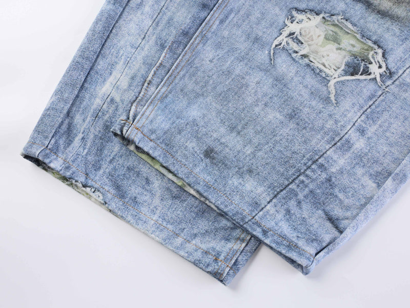 Close-up of hem and lower leg on washed blue jeans
