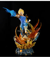 The Seakoff Vegeta Super Saiyan Collectible Figure (45cm) features a muscular Vegeta in a blue outfit, spiky blond hair, and rocky base. With interchangeable heads and glowing effects, he stands amid an orange aura, arm extended for a blue energy attack—a must-have Dragon Ball Z piece.