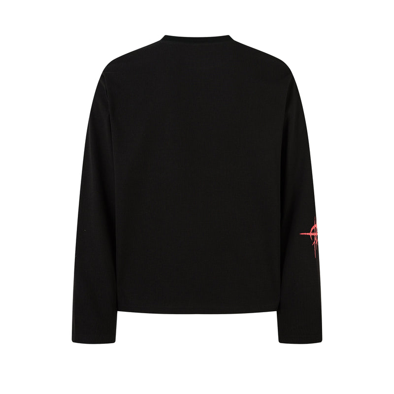 Back view of black long sleeve tee with plain textured knit and no graphic print