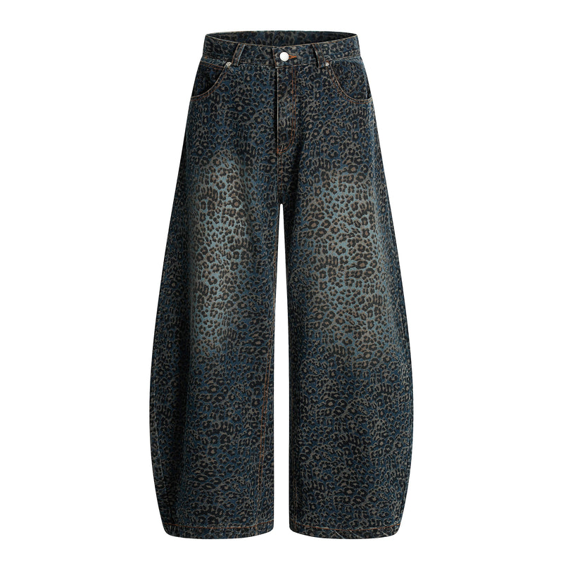 Leopard print wide-leg jeans in dark blue denim, front view