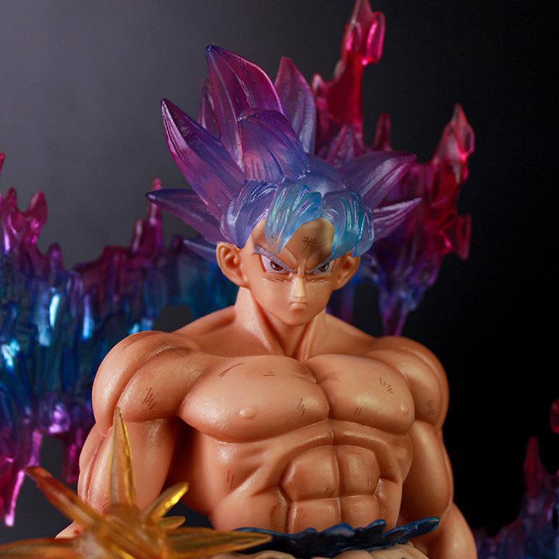 The Seakoff Goku Ultra Instinct collectible figure (35cm) is a glowing action statue featuring a shirtless, muscular character with spiky blue and purple hair, set against a backdrop of colorful, jagged crystal-like structures.