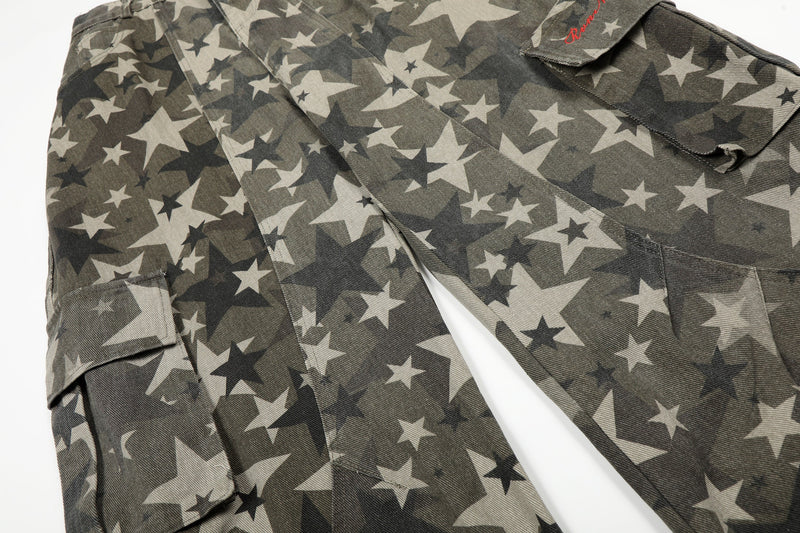 Close-up of upper legs and cargo pocket flaps on star camo barrel-leg pants