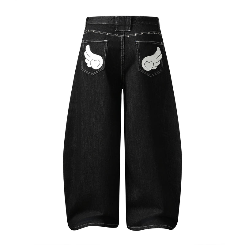 Back view of black wide-leg denim jeans with wing graphic back pockets