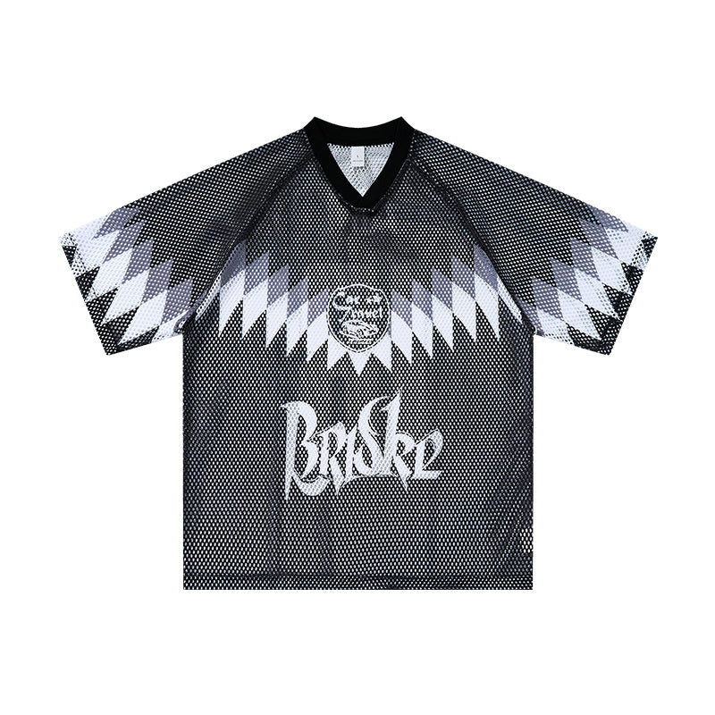 Omirad AIM 18 black mesh jersey t-shirt front view with gothic logo, crest graphic, and geometric spike shoulder design