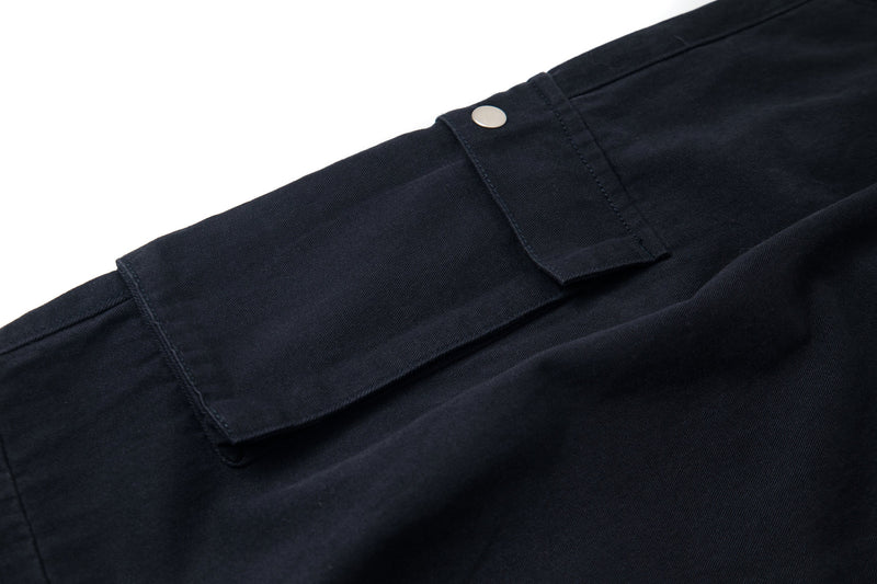 Black cargo pants side cargo pocket with snap flap close-up