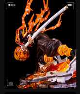 The Rengoku Kyojuro Demon Slayer Figure - Flame Hashira - 28cm is a dynamic PVC piece by Demon Slayer, featuring the character with yellow spiky hair in a fiery cloak, posed mid-air wielding a large sword. The base has flame and debris details, with an image "REC" frame for a camcorder effect.