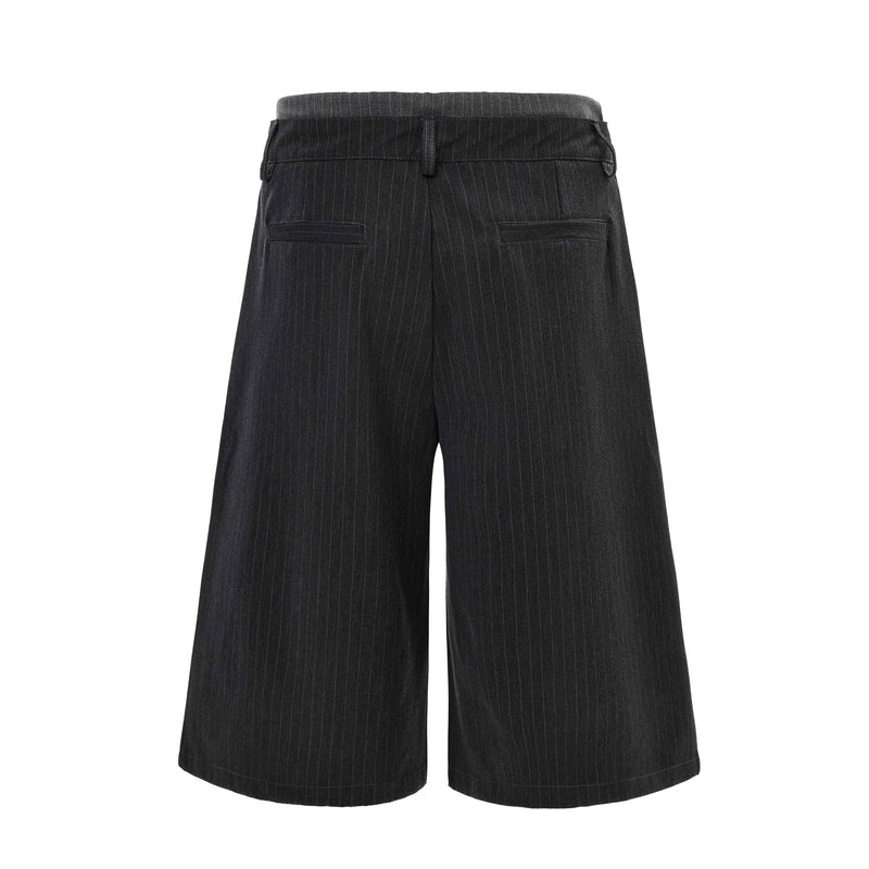Back view of charcoal pinstripe wide-leg shorts with welt pockets and wide legs