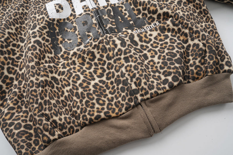 Leopard print zip-up hoodie midsection with kangaroo pocket and ribbed hem