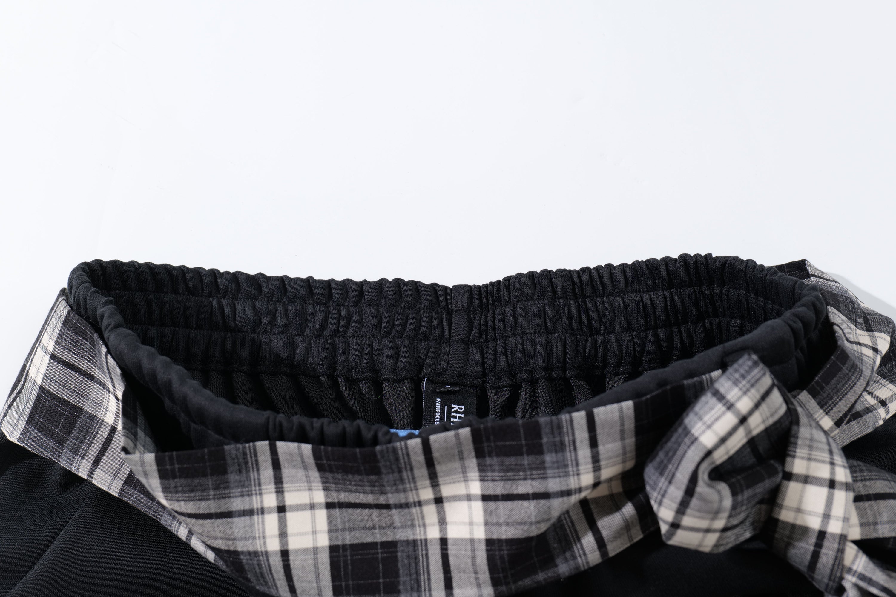 Omirad Plaid-Waist Barrel Track Pants | Bold Script Print