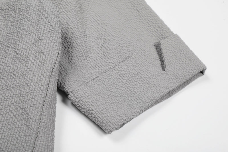 Textured light gray cotton shirt sleeve with asymmetrical cuff and clean minimal streetwear design
