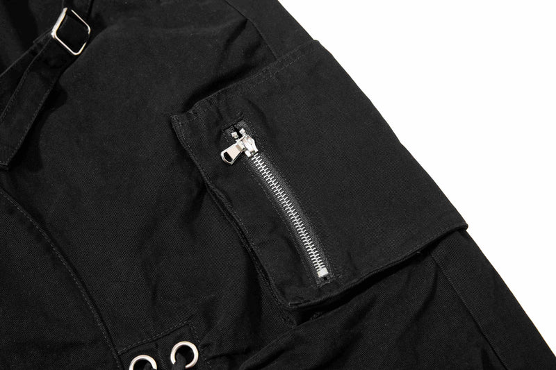 Black shorts side cargo pocket with zipper detail, close-up