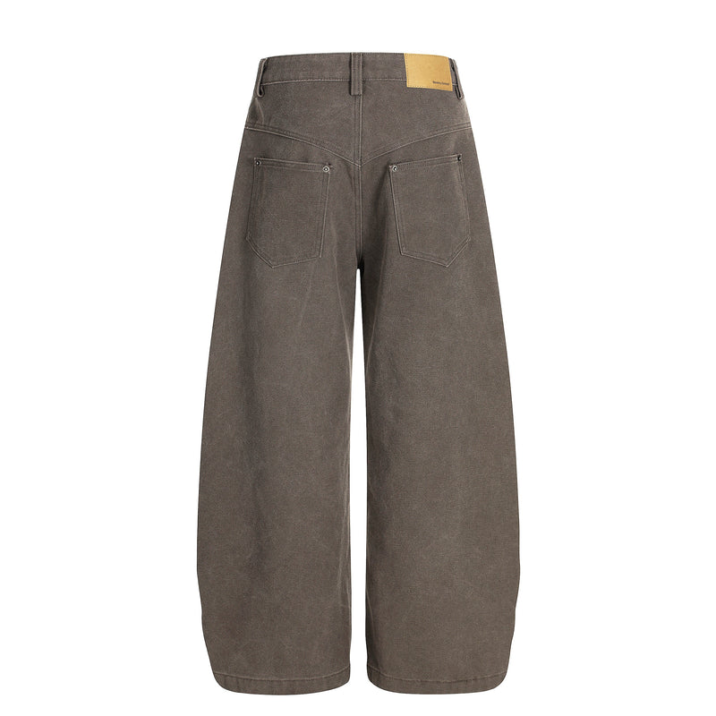 Back view of brown wide-leg workwear pants with two patch pockets
